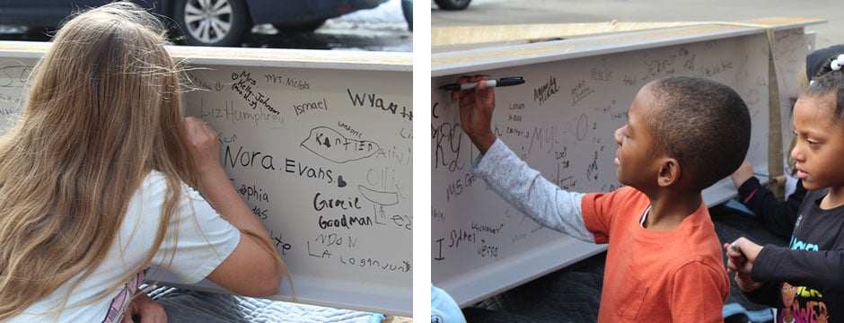 students-signing-construction-beam-2