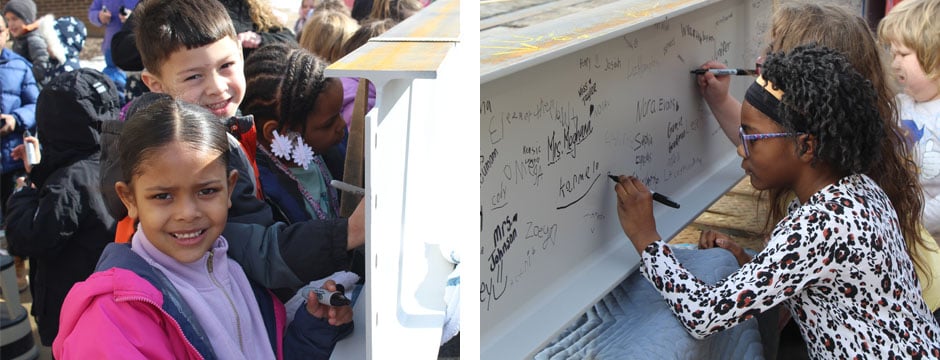 students-signing-construction-beam-wi