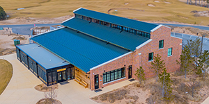 Building Distinctive Spaces: Exploring the Award-Winning Design and Construction of Sand Valley Tennis Club